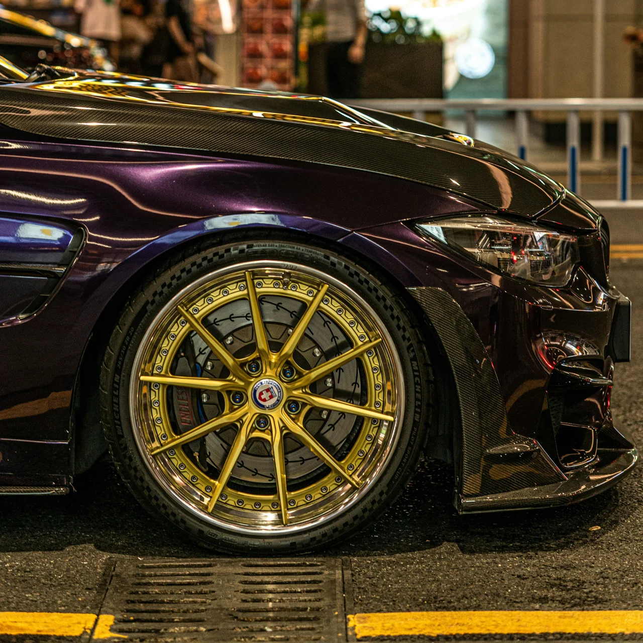 HRE S104SC multi-piece wheel on a purple car